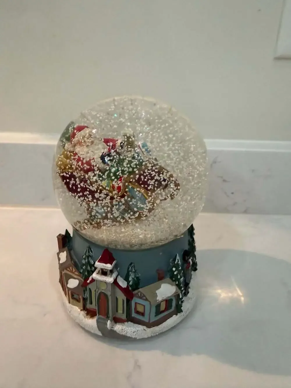Roman Santa in Sleigh Musical Glitter Snow Globe with Winter Village Base